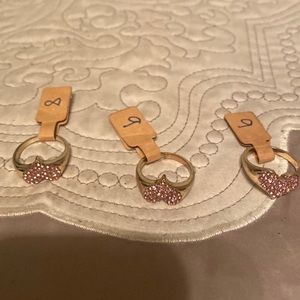 I am selling 3 gold heart rings